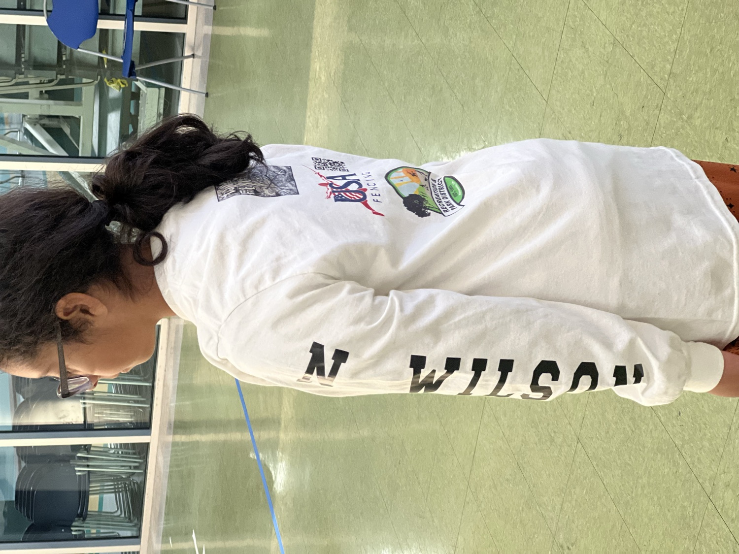 Back of the Mojave Fencing long-sleeve tee showing USA Fencing and club crests